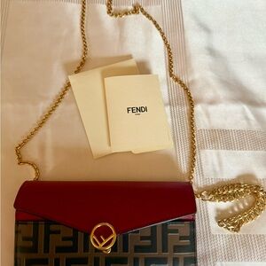 Authentic Fendi Crossbody Bag
(Wrist chain not authentic)